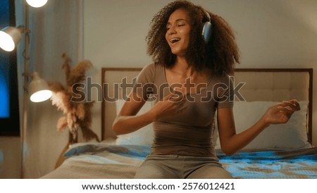 Similar – Image, Stock Photo Woman pretending to play the guitar