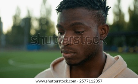 Similar – Image, Stock Photo Ethnic sportsman standing and looking at camera on street