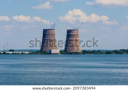 Cooling towers of Zaporizhzhia Nuclear Power Station near city Enerhodar, Ukraine 商業照片 © 
