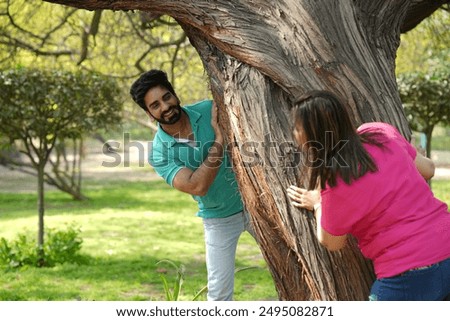 Similar – Image, Stock Photo Happy couple enjoying time together on evening beach
