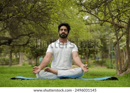 Image, Stock Photo Man doing yoga by the beach