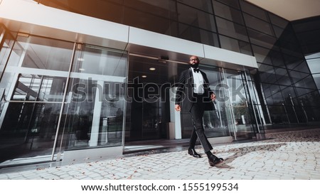 Similar – Image, Stock Photo Fancy man reflecting in mirror on ground