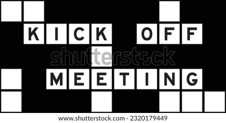 Alphabet letter in word kick off meeting on crossword puzzle background