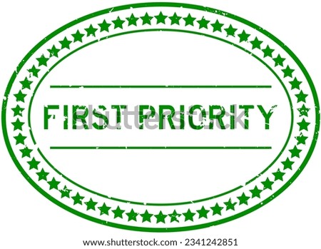 Grunge green first priority word oval rubber seal stamp on white background