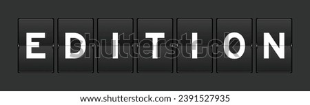 Black color analog flip board with word edition on gray background