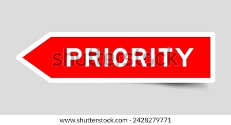 Red color arrow shape sticker label with word priority on gray background