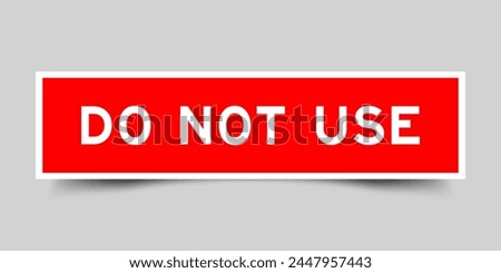 Red color square label sticker with word do not use that inserted in gray background