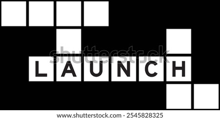 Alphabet letter in word launch on crossword puzzle background