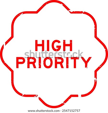 Grunge red high priority word rubber seal stamp on white background