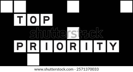 Alphabet letter in word top priority on crossword puzzle background