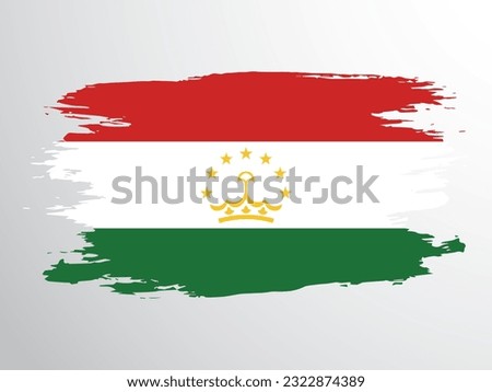 Tajikistan flag painted with a brush. Vector flag of Tajikistan.