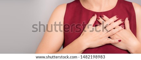 Banner of faithful woman's hands on chest near heart showing thankful or kindness. Concept of Health care, Charity, Organ Donation, Grateful, Relief, Peaceful, Hopeful, Love, honest, Appreciation. Foto stock © 