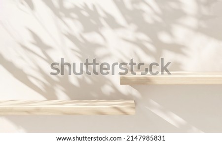 Beautiful realistic 3D render, empty oak wood shelves with wood grain under leaves foliage shadow, beige wall in background. Products overlay, Mock up, Beauty, Organic, Natural concept, Eco friendly Photo stock © 