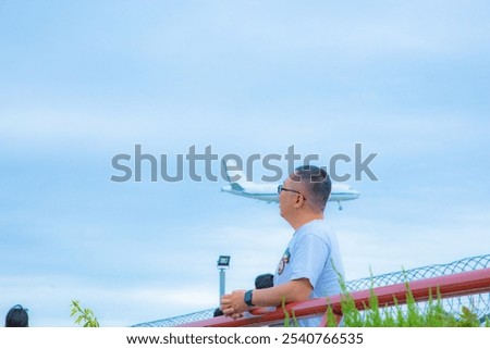 Similar – Image, Stock Photo Faceless person taking photo of Hispanic woman