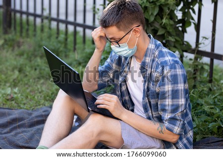 Similar – Image, Stock Photo Corona Thoughts | Fenced off green area with red and white barrier grid and red and white barrier tape that flutters in the evening wind