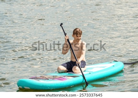 Similar – Image, Stock Photo Boy under surfboard Joy