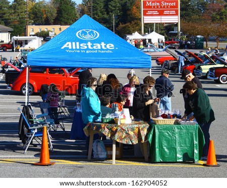 GLOUCESTER, VA- NOVEMBER 9: An Allstate insurance tent in the Shop with a Cop Car Show in Gloucester, Virginia on November 9, 2013