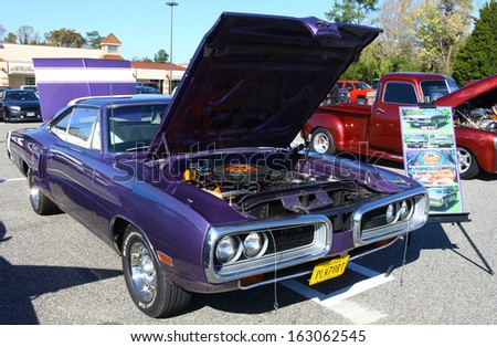 GLOUCESTER, VA- NOVEMBER 9: A 1970 Dodge Coronet R/T in the Shop with a Cop Car Show in Gloucester, Virginia on November 9, 2013