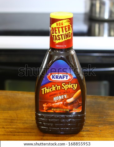 GLOUCESTER, VA - DECEMBER 26, 2013: Kraft Honey BBQ sauce. Kraft Foods Group Inc is an American grocery manufacturing and processing conglomerate headquartered in Northfield, Illinois.