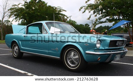 GLOUCESTER, VIRGINIA - AUGUST 23, 2014:A 1966 Ford Mustang in the DRIVE-IN FOR DIABETES CAR SHOW Sponsored by Tractor Supply in August in Gloucester Virginia.