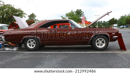 GLOUCESTER, VIRGINIA - AUGUST 23, 2014:A Chevy Impala Super Sport in the DRIVE-IN FOR DIABETES CAR SHOW Sponsored by Tractor Supply in August in Gloucester Virginia.