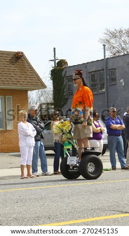 GLOUCESTER, VA - April 11, 2015: The Khedive Beach Bum Brothers on Segways at the 29th annual Daffodil fest and parade, The Daffodil fest and Parade is a regular event held each spring
