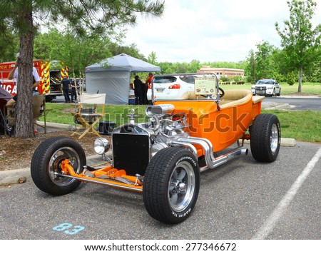 WILLIAMSBURG, VA - May 9, 2015: An old 1923 Ford T-Bucket coupe hot rod at the 6th Annual Project Lifesaver Car Show in Williamsburg Virginia on a summer day.