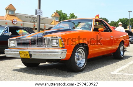GLOUCESTER, VA- JULY 19: An orange Chevrolet ElCamino at the 2015 Middle Peninsula Classic Car Club blast from the past car show in Gloucester Virginia on a sunny summer day