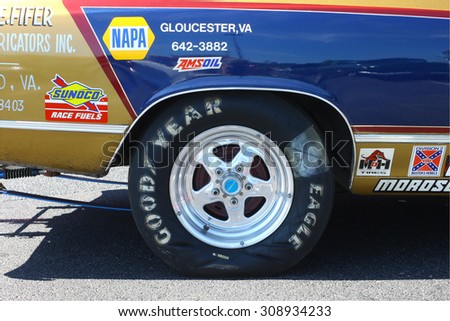 GLOUCESTER, VIRGINIA - AUGUST 22, 2015:A wrinkle tire on a blown and tubbed 1966 Chevy II SS in the DRIVE-IN FOR DIABETES CAR SHOW Sponsored by Tractor Supply in August in Gloucester Virginia.