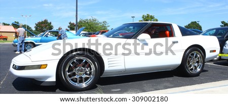 GLOUCESTER, VIRGINIA - AUGUST 22, 2015:A white Chevrolet corvette in the \
DRIVE-IN FOR DIABETES CAR SHOW Sponsored by Tractor Supply in August in \
Gloucester Virginia.