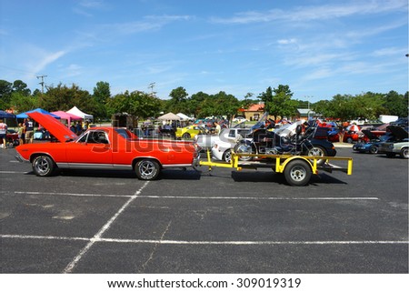 GLOUCESTER, VIRGINIA - AUGUST 22, 2015:A Chevy ElCamino trailering a Honda Gold Wing in the DRIVE-IN FOR DIABETES CAR SHOW Sponsored by Tractor Supply in August in 
Gloucester Virginia.
