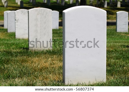 A row of marble headstones in a graveyard with room for your text