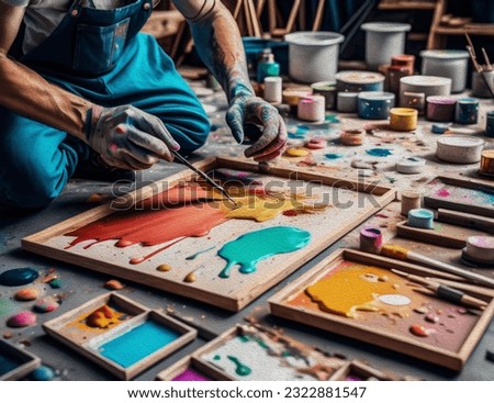 Similar – Image, Stock Photo Focused artist blending paints in palette