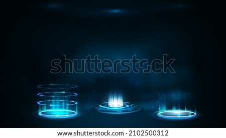 Set of blue digital teleports in cylindrical shape with shiny swirl rings on dark background for your arts Stock foto © 