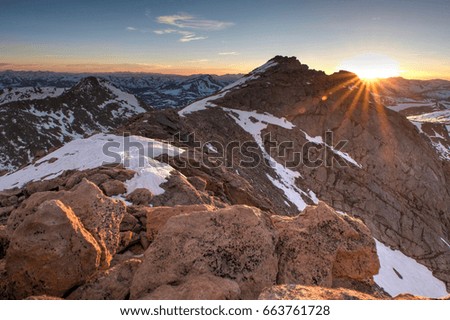 Similar – Foto Bild Roter Sonnenuntergang über felsigem Meeresufer