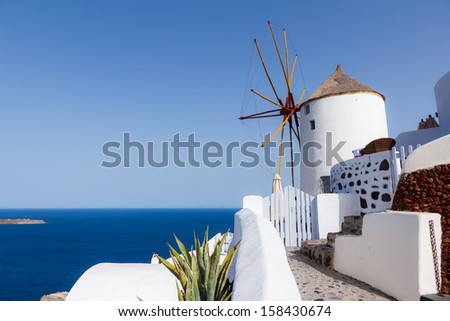 View of the Windmill and the Sea in Oia, Santorini, Greece