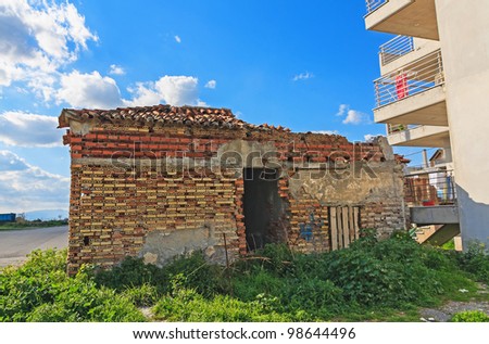 Old abandoned brick house ruins after an earthquake