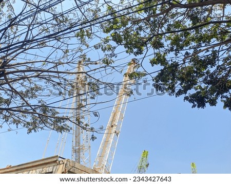 Similar – Image, Stock Photo Crane behind scaffolding