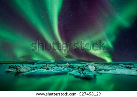 A wonderful night with Kp 5 northern lights flying over the Glacier Lagoon in iceland
 Stock foto © 
