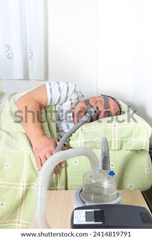 Similar – Image, Stock Photo Senior man inhaling airways and lungs applying medicine. Covid-19 or coronavirus treatment. Man breathing through face mask using nebuliser
