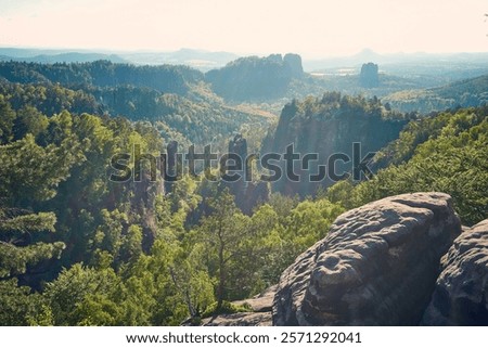 Similar – Elbsandsteingebirge, view from the Bastei bridge to the Ganssteine