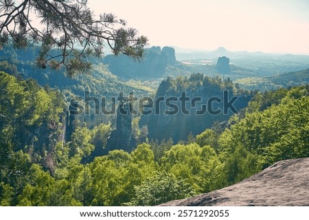 Similar – Elbsandsteingebirge, view from the Bastei bridge to the Ganssteine