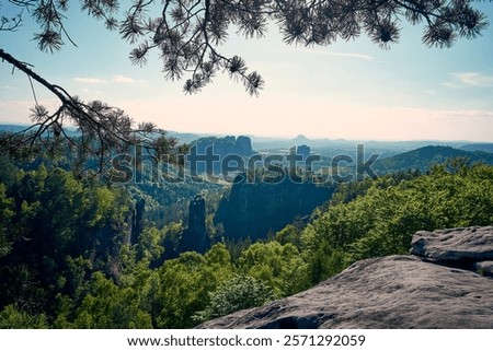 Similar – Elbsandsteingebirge, view from the Bastei bridge to the Ganssteine