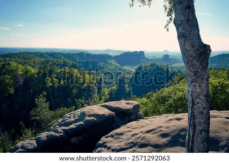 Similar – Elbsandsteingebirge, view from the Bastei bridge to the Ganssteine