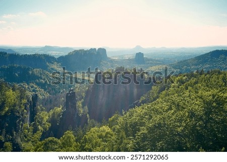 Similar – Elbsandsteingebirge, view from the Bastei bridge to the Ganssteine