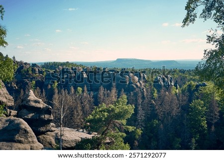 Similar – Elbsandsteingebirge, view from the Bastei bridge to the Ganssteine