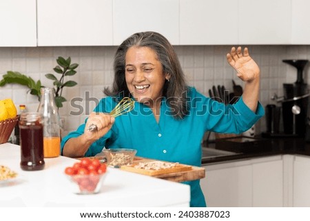 Similar – Image, Stock Photo Playful ethnic women having fun while eating sushi table in restaurant