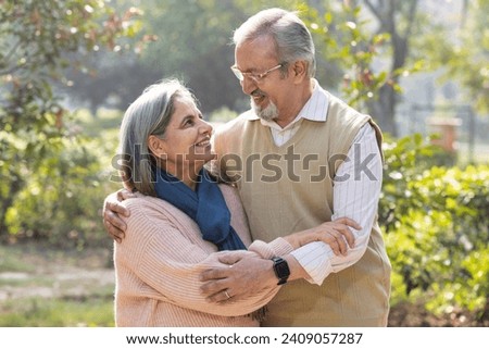 Similar – Image, Stock Photo Loving couple embracing while sitting on apartment floor