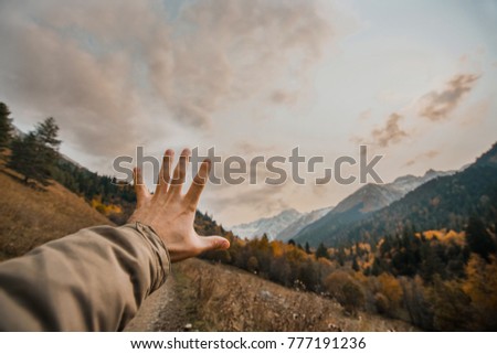 Similar – Image, Stock Photo Human hand reaching Wind Turbines Windmill Energy on the nature, during a super sunny day, with copy space and a lot of air