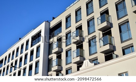 Facade of a modern apartment condominium in a sunny day. Modern condo buildings with huge windows and balconies. ストックフォト © 